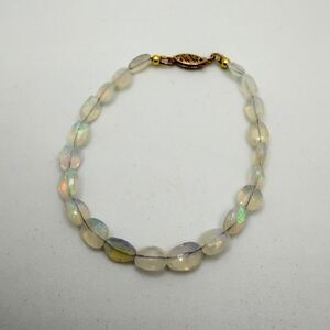 ~7.5" Faceted oval shaped OPAL beaded bracelet with vintage 14kt YG clasp!
